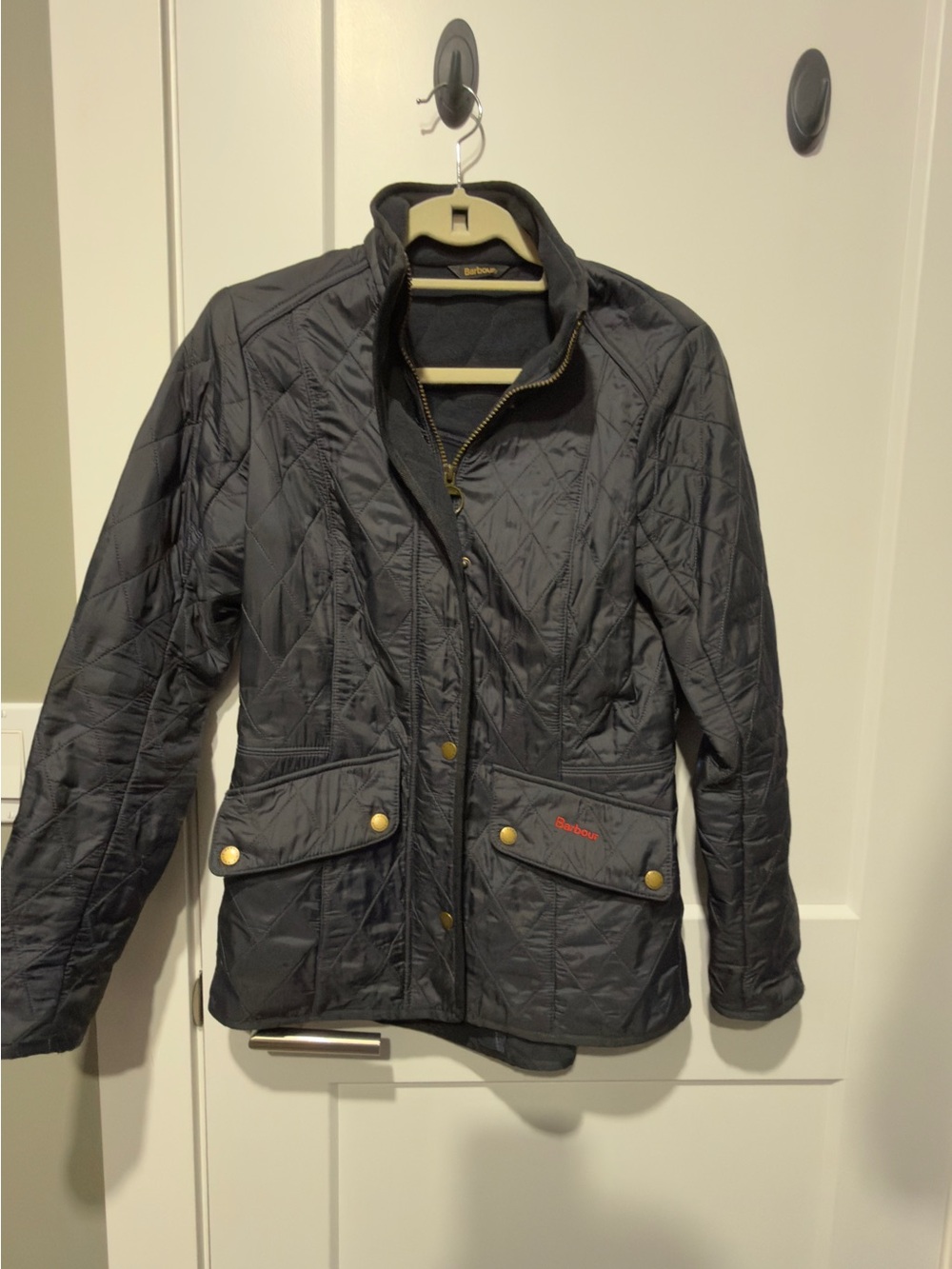 Barbour Quilted Utility Jacket in Black with Brass Details